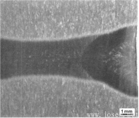 图1-40 Ti600合金厚板电子束焊缝低倍组织（锥形熔池线清晰可见）.png